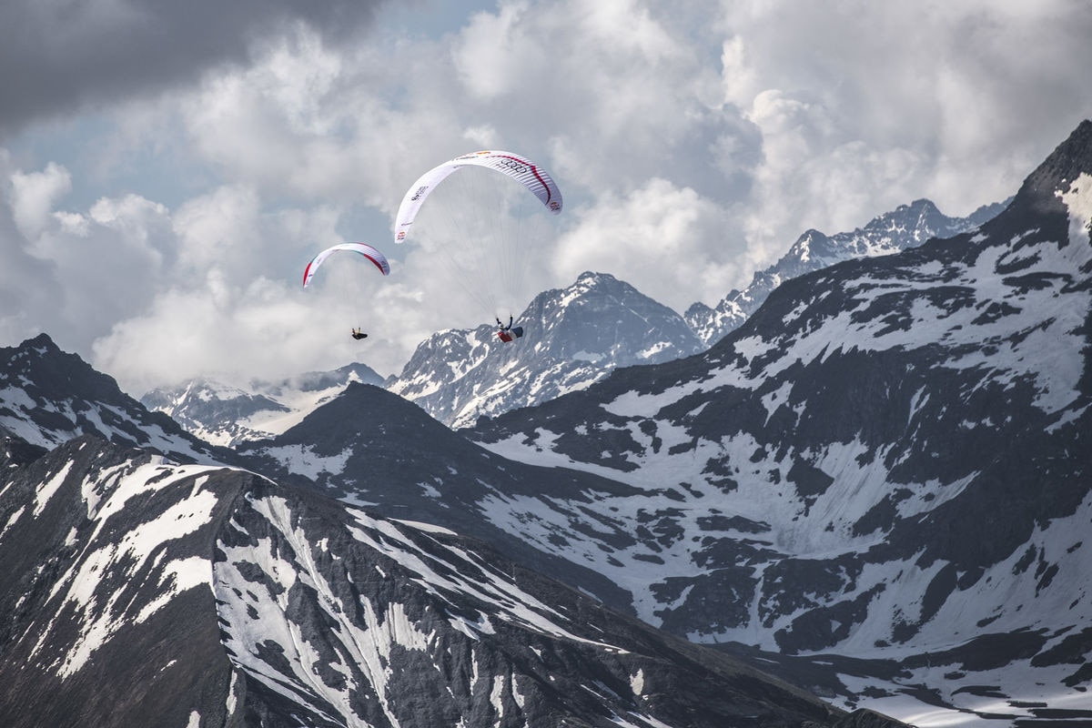 Maxime Pinot (FRA4) and Christian Maurer (SUI1) race during the Red Bull X-Alps in Ahrntal, Italy on June 18, 2019.