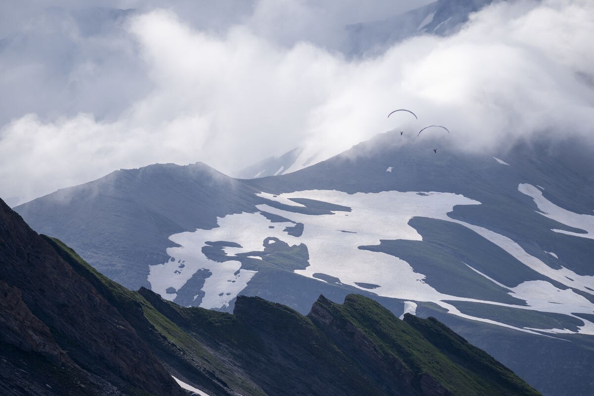 Red Bull X-Alps athletes flying in La Gorge, France on June 27, 2021.