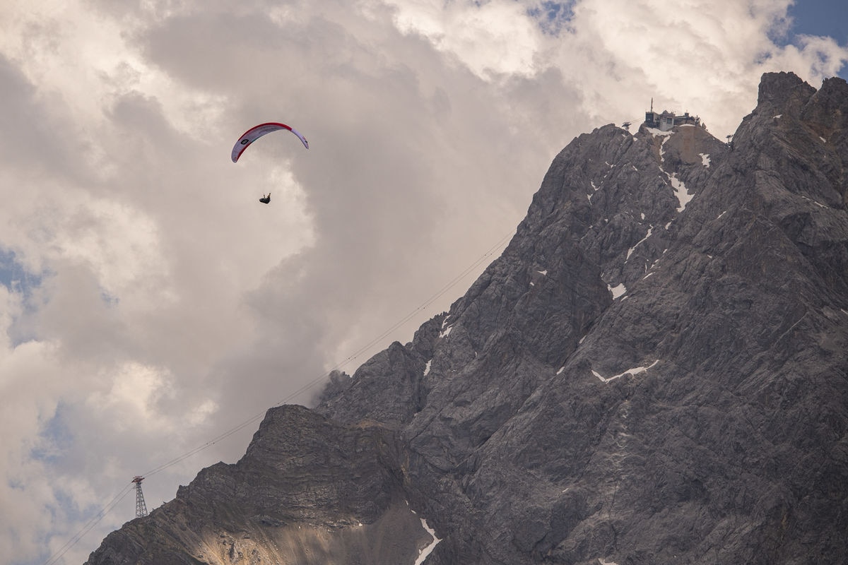 Chrigl Maurer (SUI1) races towards turnpoint Lermoos prior to the Red Bull X-Alps, Austria on June 22, 2021.