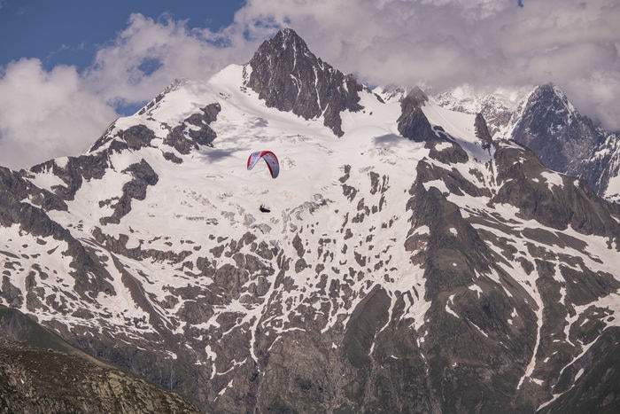 Chrigl Maurer (SUI1) performing during the Red Bull X-Alps at the Mt Blanc / France on 26-June-2021. In this endurance adventure race athletes from 18 nations have to fly with paragliders or hike from Salzburg along the alps towards France, around the Mont Blanc back to Salzburg.