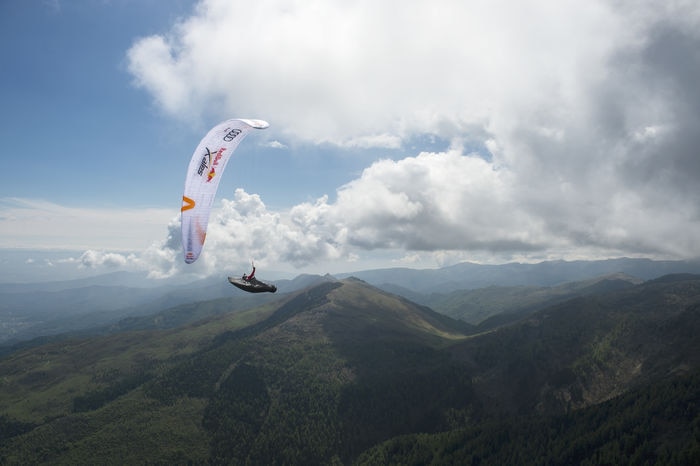 Participant flies during the Red Bull X-Alps preparations in Paesana, Italy on may 22, 2019