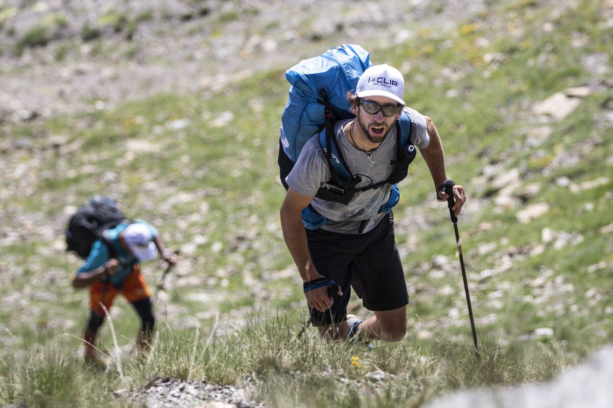 Manuel Nuebel (GER1) hikes during the Red Bull X-Alps in Barcelonnette, France on June 26, 2019