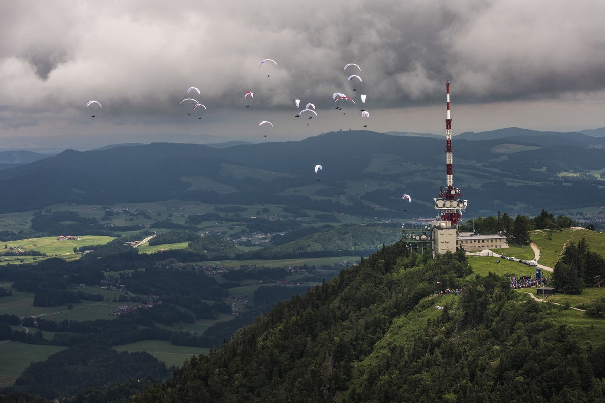 Competitors race during the Red Bull X-Alps at the Gaisberg in Salzburg, Austria on June 16, 2019.