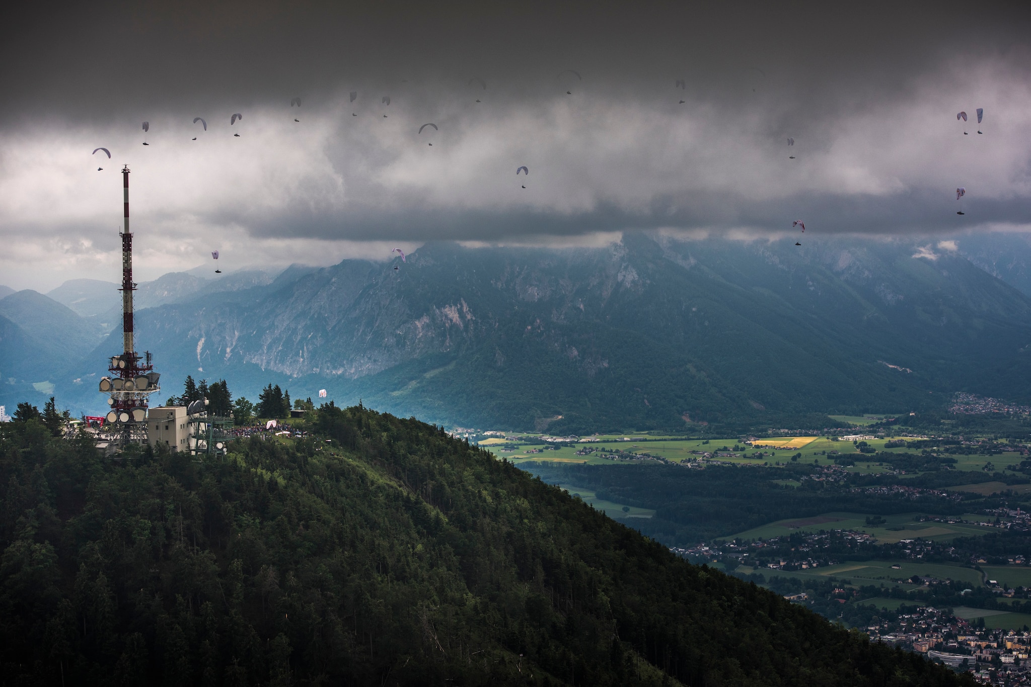 Competitors race during the Red Bull X-Alps at the Gaisberg in Salzburg, Austria on June 16, 2019.