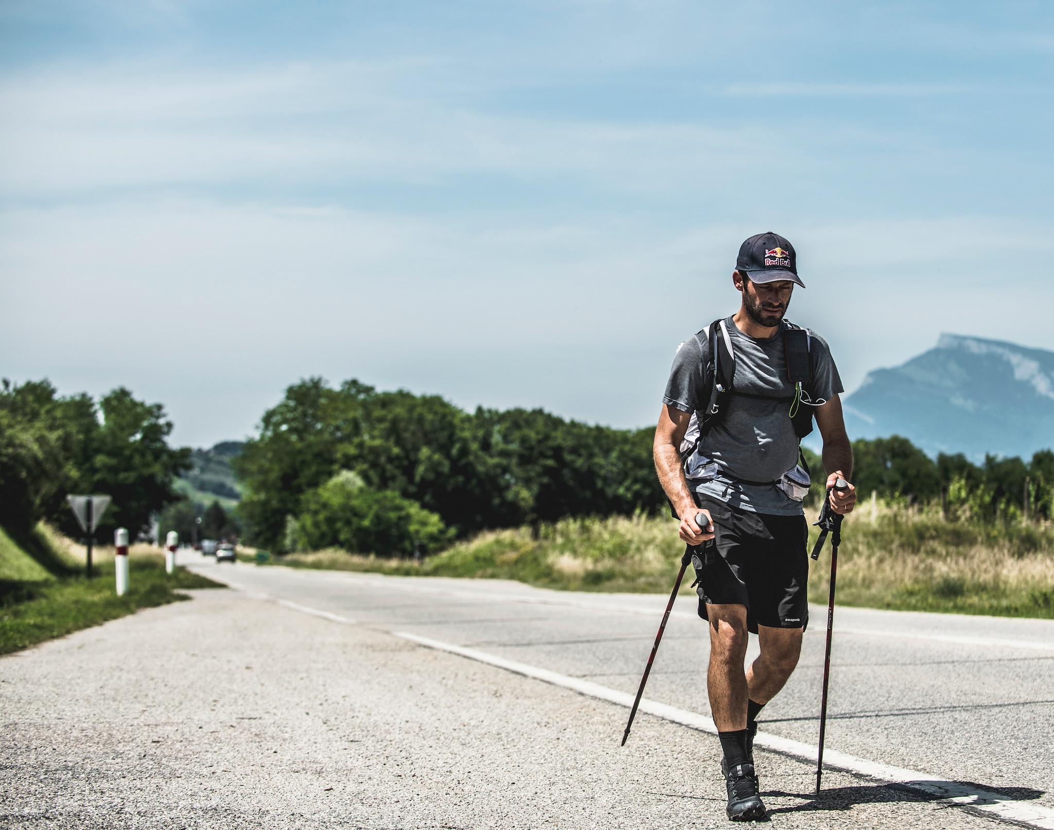 Tom De Dorlodot (BEL) walkes through the villages of Barraux, France at the Red Bull X-Alps on June 24, 2019