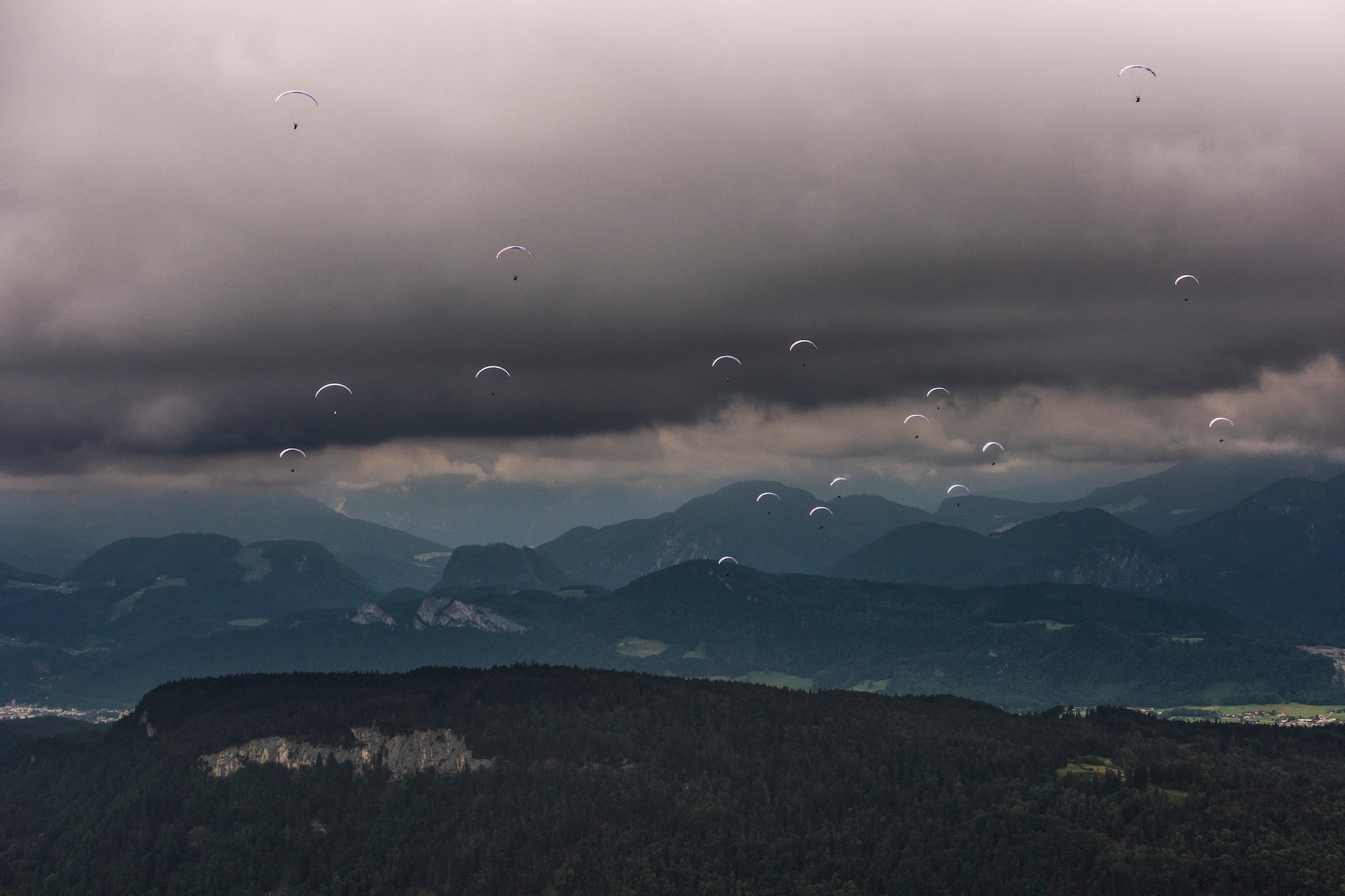 Competitors race during the Red Bull X-Alps at the Gaisberg in Salzburg, Austria on June 16, 2019.