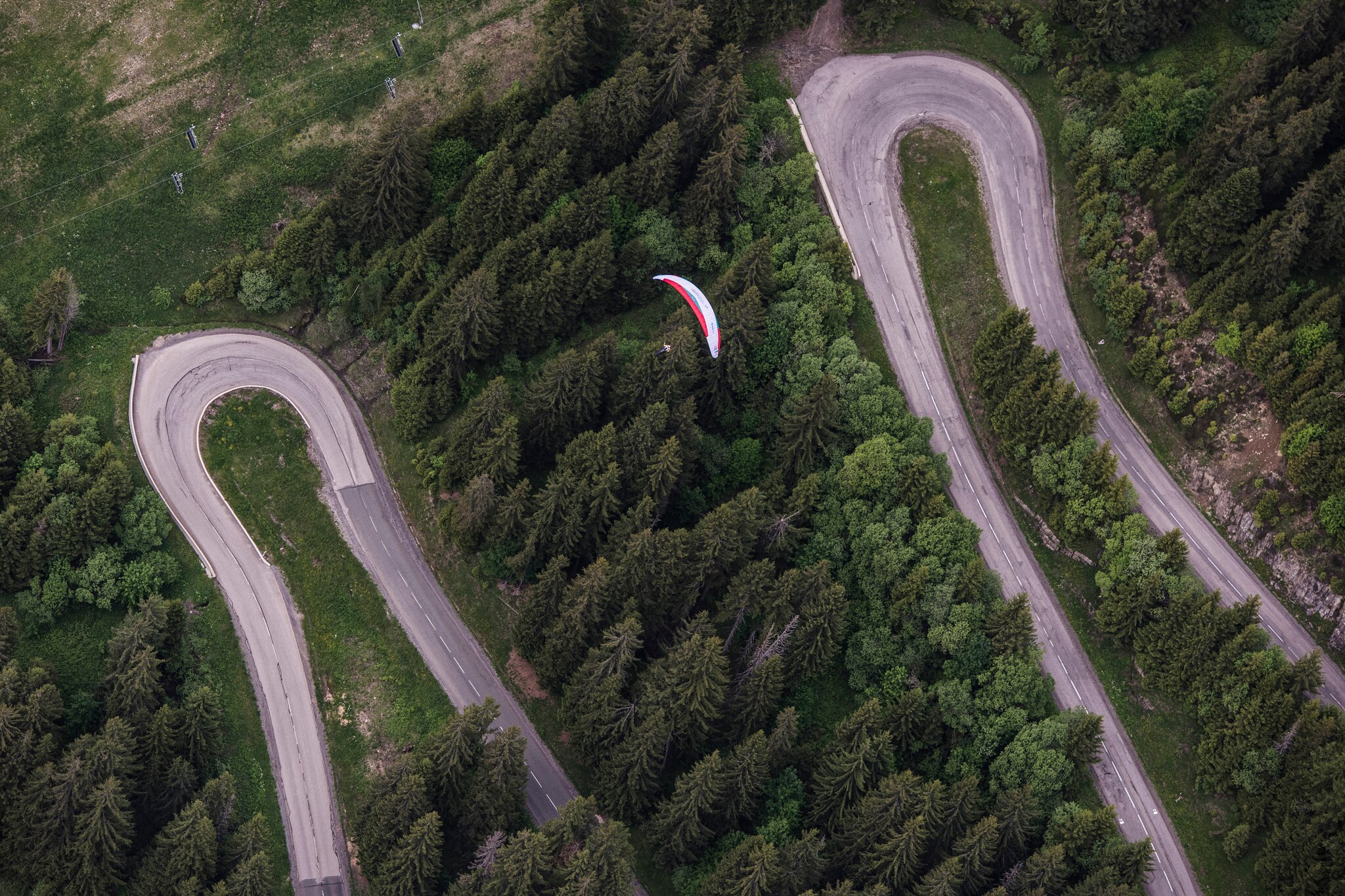 Christian Maurer (SUI1) races during the Red Bull X-Alps above Cluses, France on June 21, 2019.