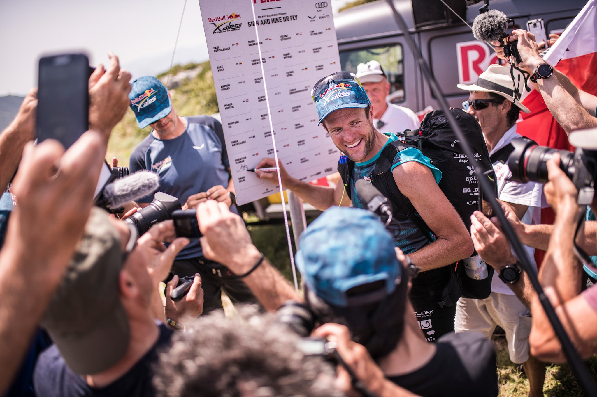 Chrigel Maurer (SUI1) putting his name on the final signboard in Monaco. © Sebastian Marko / zooom