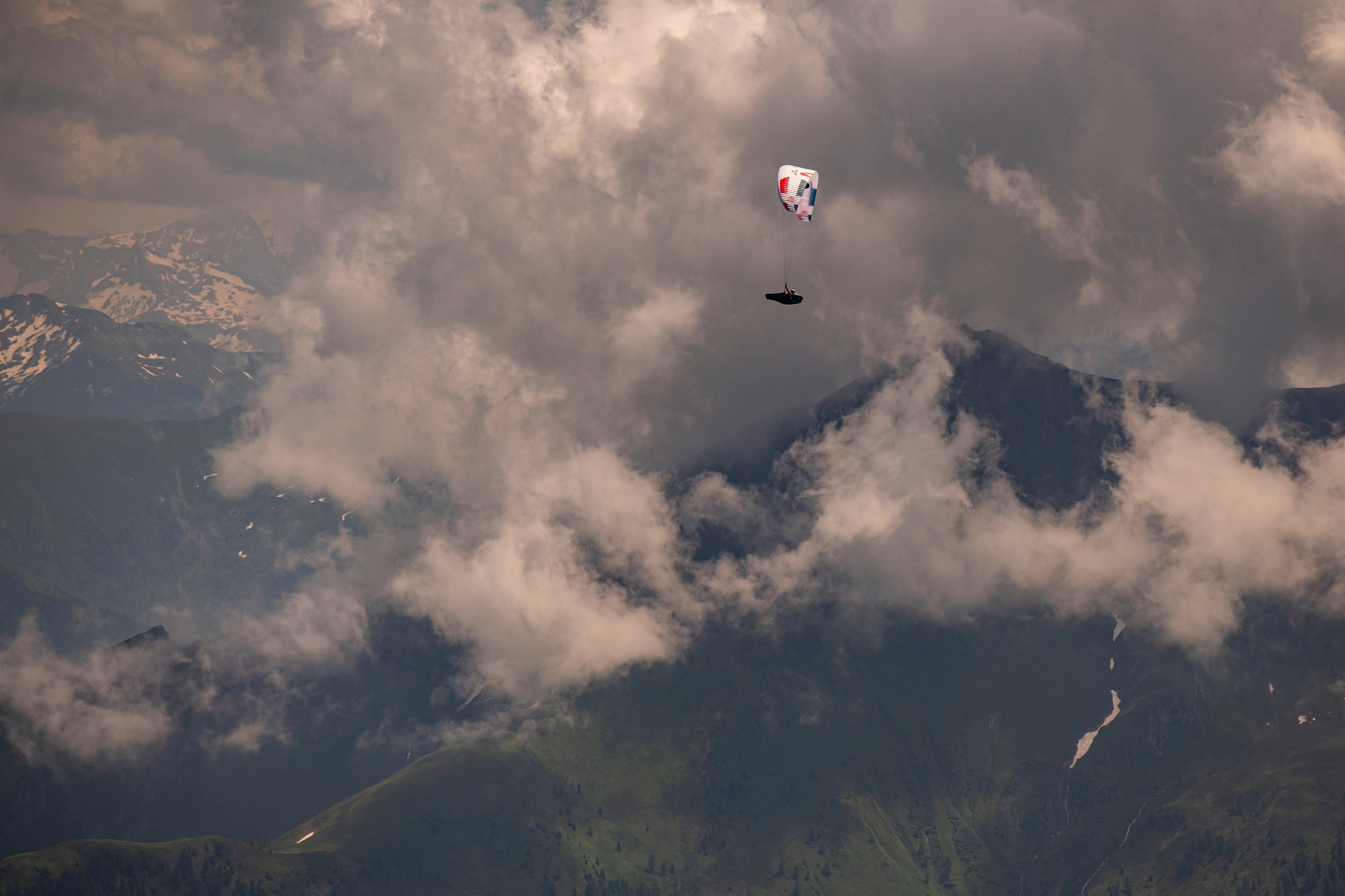 Simon Oberrauner (AUT2) performing during the Red Bull X-Alps at Zell am See / Austria on 29-June-2021. In this endurance adventure race athletes from 18 nations have to fly with paragliders or hike from Salzburg along the alps towards France, around the Mont Blanc back to Zell am See.