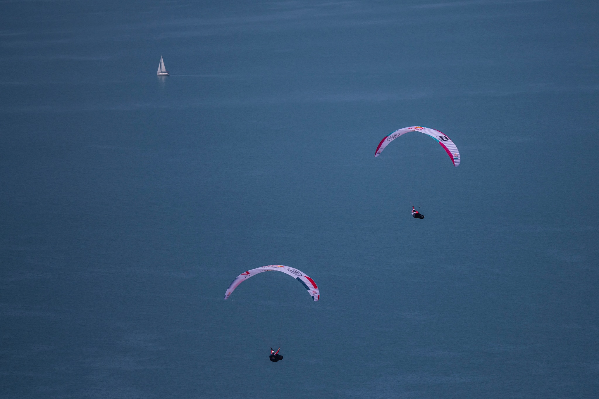 Markus Anders (GER2),and Aaron Durogati (ITA1) race at the Chiemsee prior to the Red Bull X-Alps, Germany on June 21, 2021.