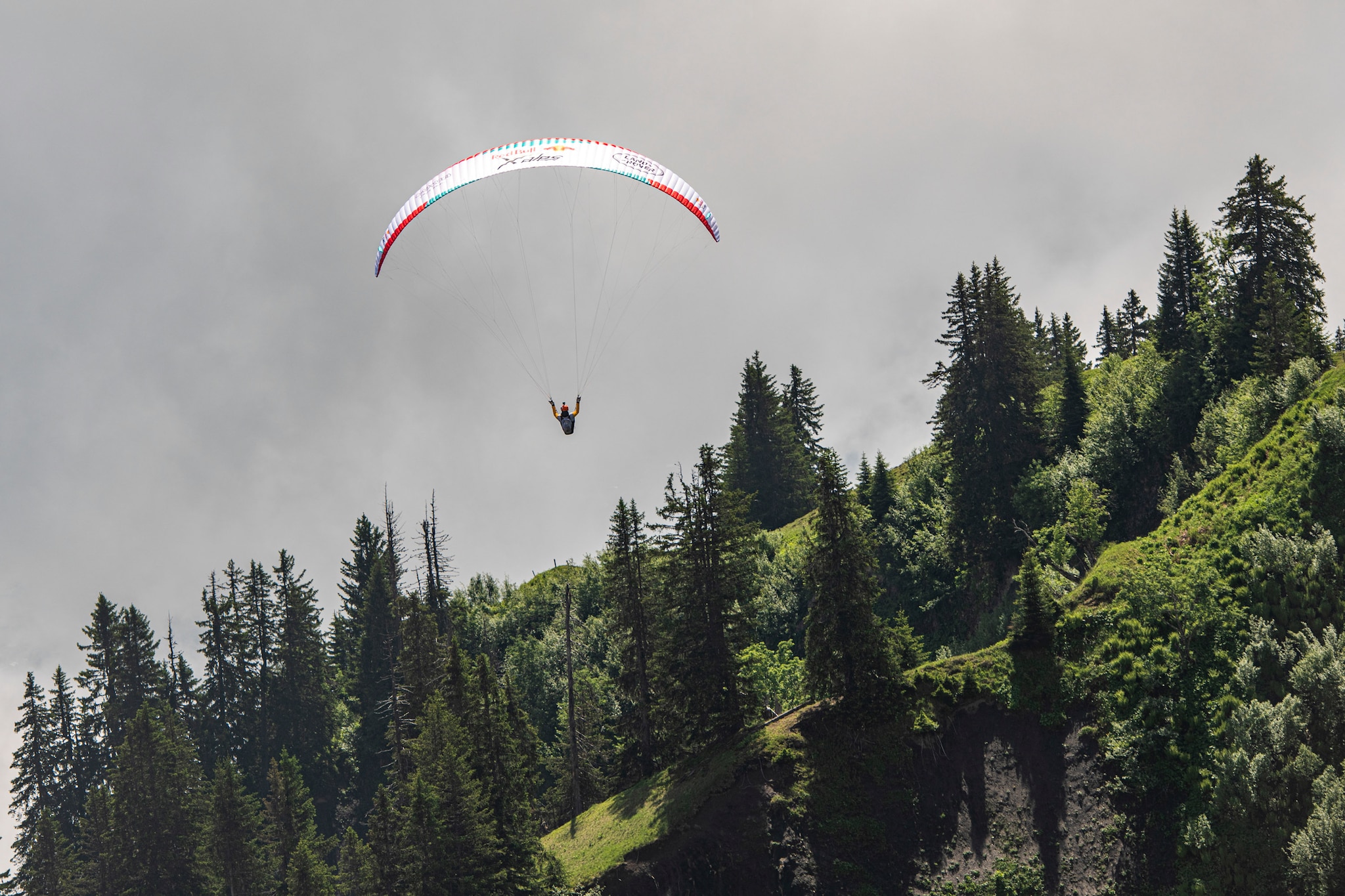 Chrigl Maurer (SUI1) performing during the Red Bull X-Alps in Montafon / Austria on 23-June-2021. In this endurance adventure race athletes from 18 nations have to fly with paragliders or hike from Salzburg along the alps towards France, around the Mont Blanc back to Salzburg.