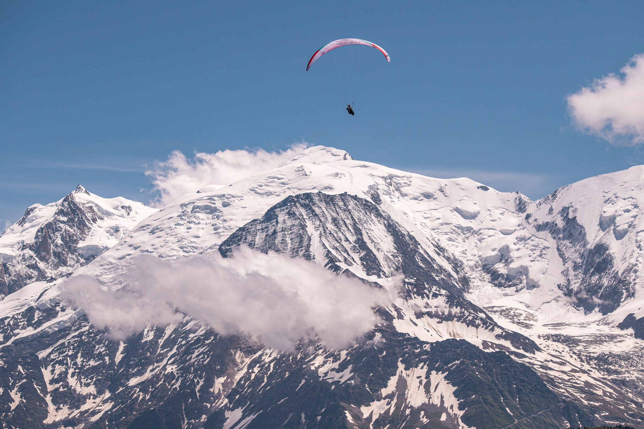 Chrigl Maurer (SUI1) performing during the Red Bull X-Alps at the Mt Blanc / France on 26-June-2021. In this endurance adventure race athletes from 18 nations have to fly with paragliders or hike from Salzburg along the alps towards France, around the Mont Blanc back to Salzburg.