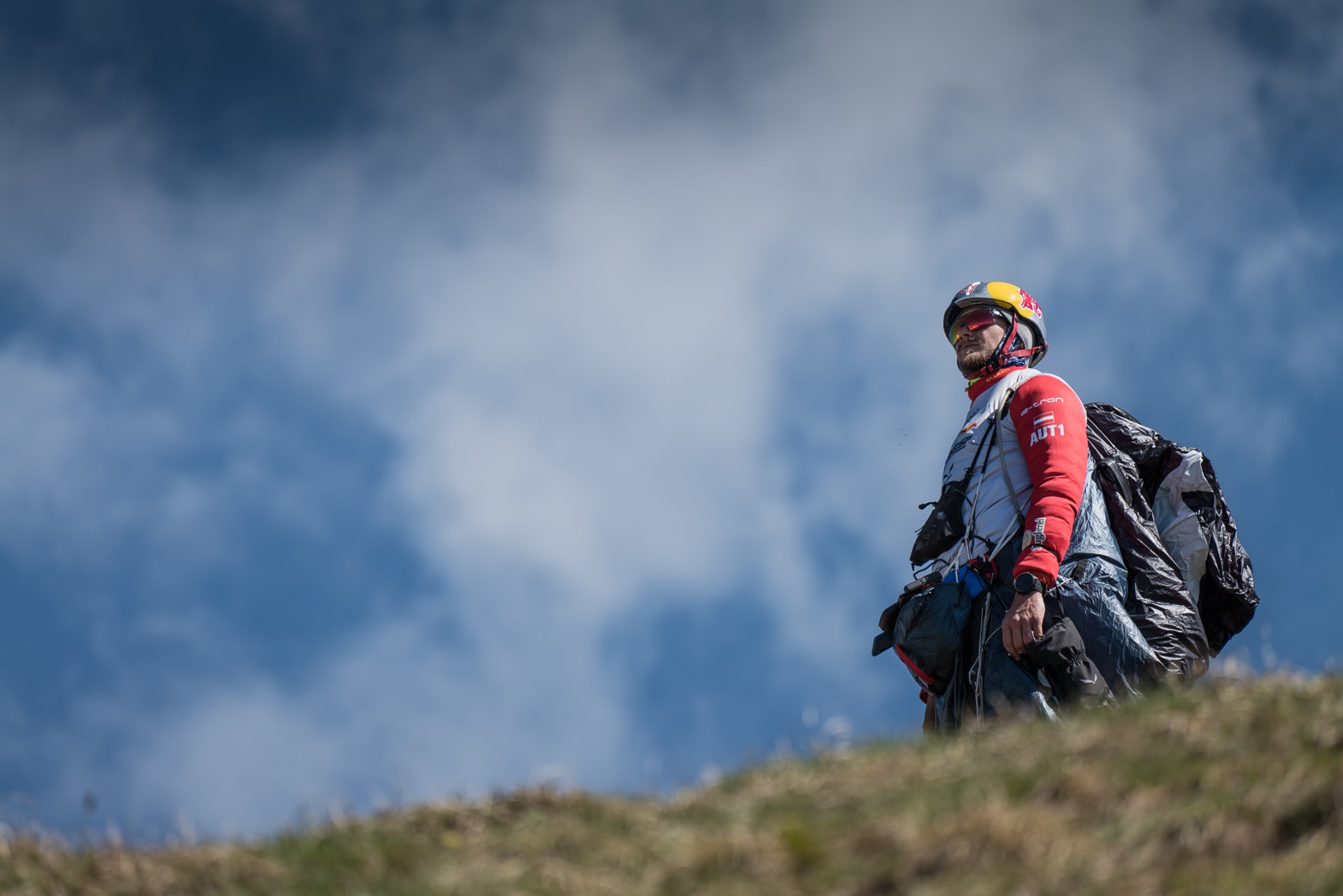Paul Guschlbauer checking the weather conditions before his take off to the next Red Bull X-Alps turnpoint, June 19, 2019 // Philipp Reiter / Red Bull Content Pool // SI201906190309 // Usage for editorial use only //