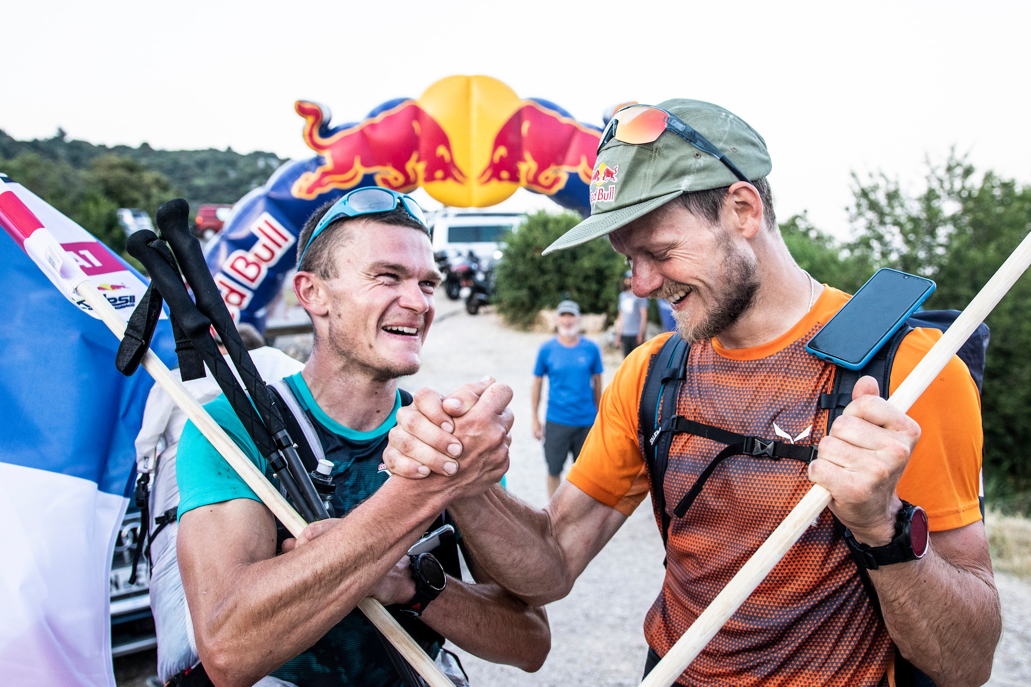 Paul Guschlbauer (AUT1) and Benoit Outters (FRA1) celebrate during the Red Bull X-Alps in Peille, France on June 26, 2019