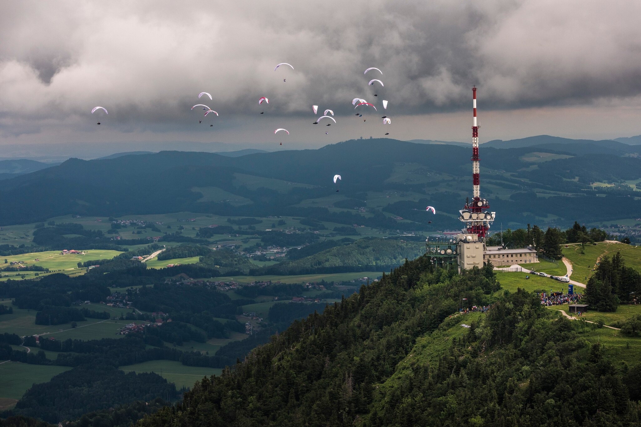 Competitors race during the Red Bull X-Alps at the Gaisberg in Salzburg, Austria on June 16, 2019.