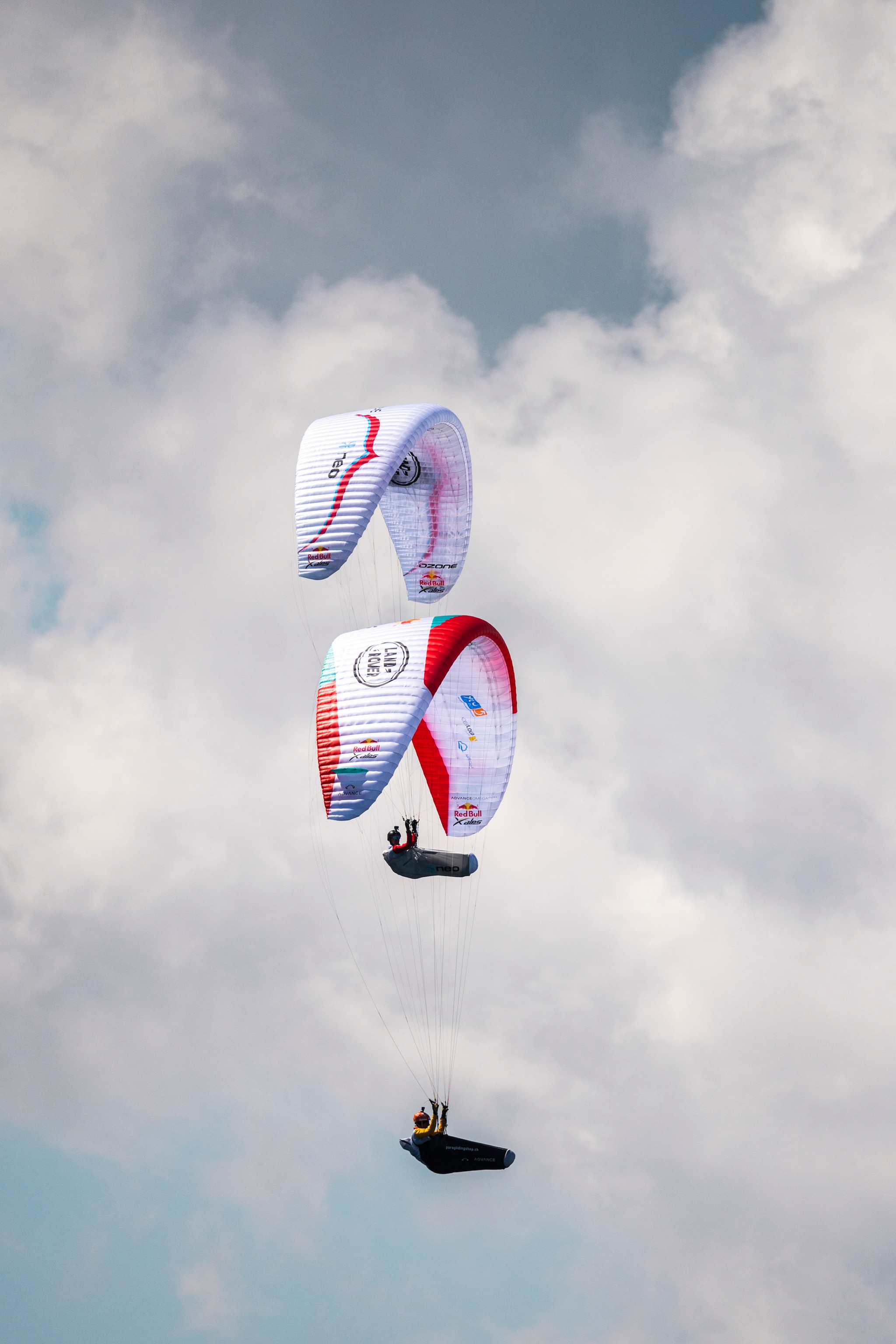 Chrigl Maurer (SUI1) of Switzerland and Maxime Pinot of France (FRA1) race at the prologue of the Red Bull X-Alps in Wagrain-Kleinarl on June 17, 2021.