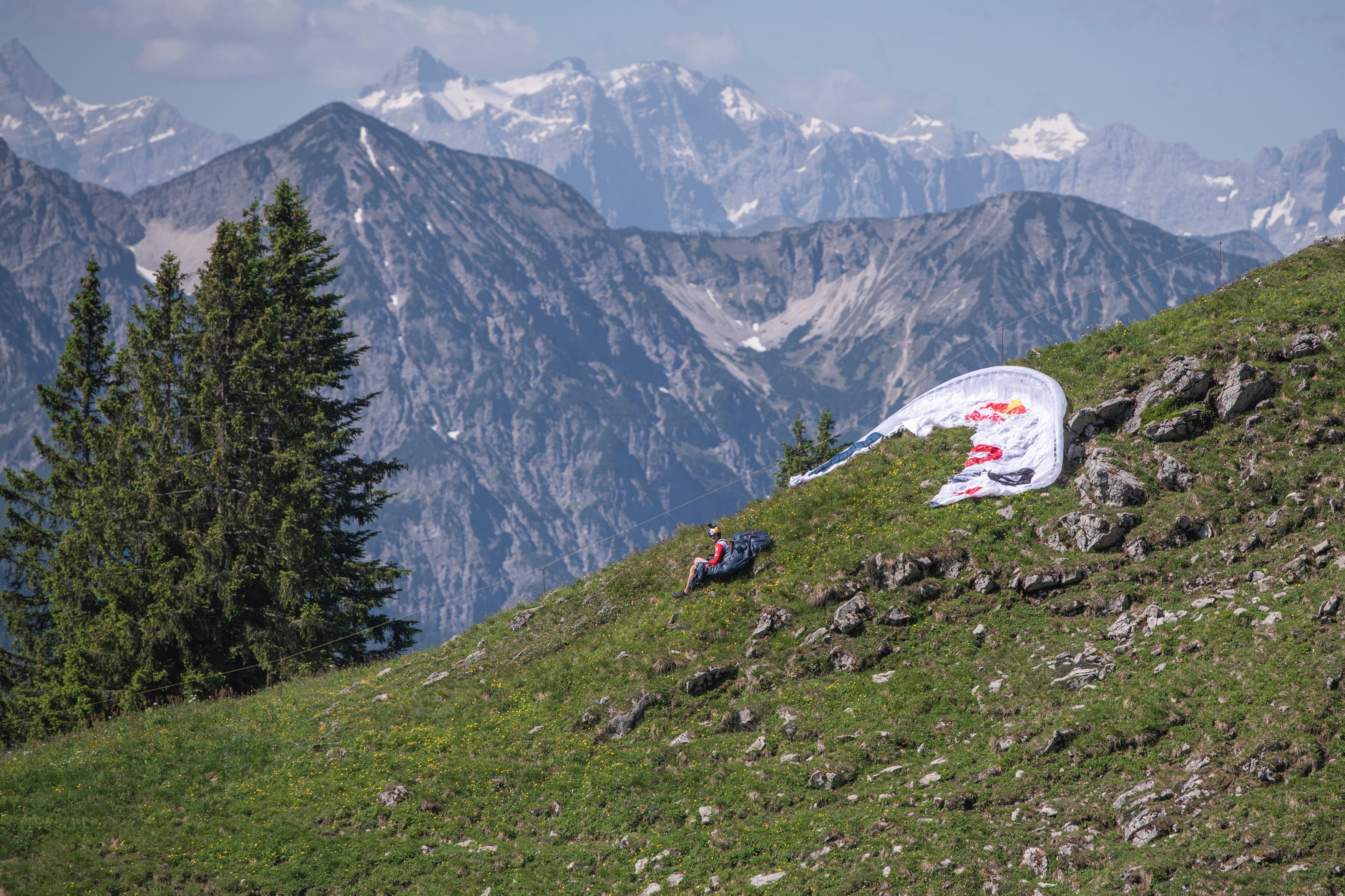 Paul Guschlbauer (AUT1) waits for thermals at the mountain range Karwendel prior to the Red Bull X-Alps, Austria on June 22, 2021.