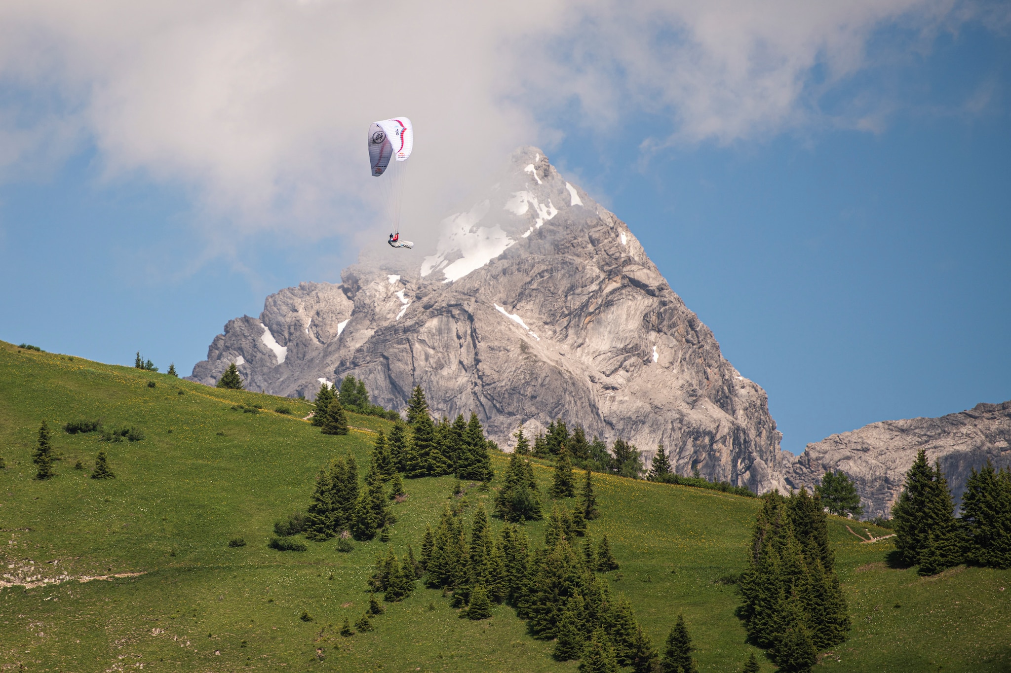 Maxime Pinot (FRA1) performing during the Red Bull X-Alps in Montafon / Austria on 23-June-2021. In this endurance adventure race athletes from 18 nations have to fly with paragliders or hike from Salzburg along the alps towards France, around the Mont Blanc back to Salzburg.