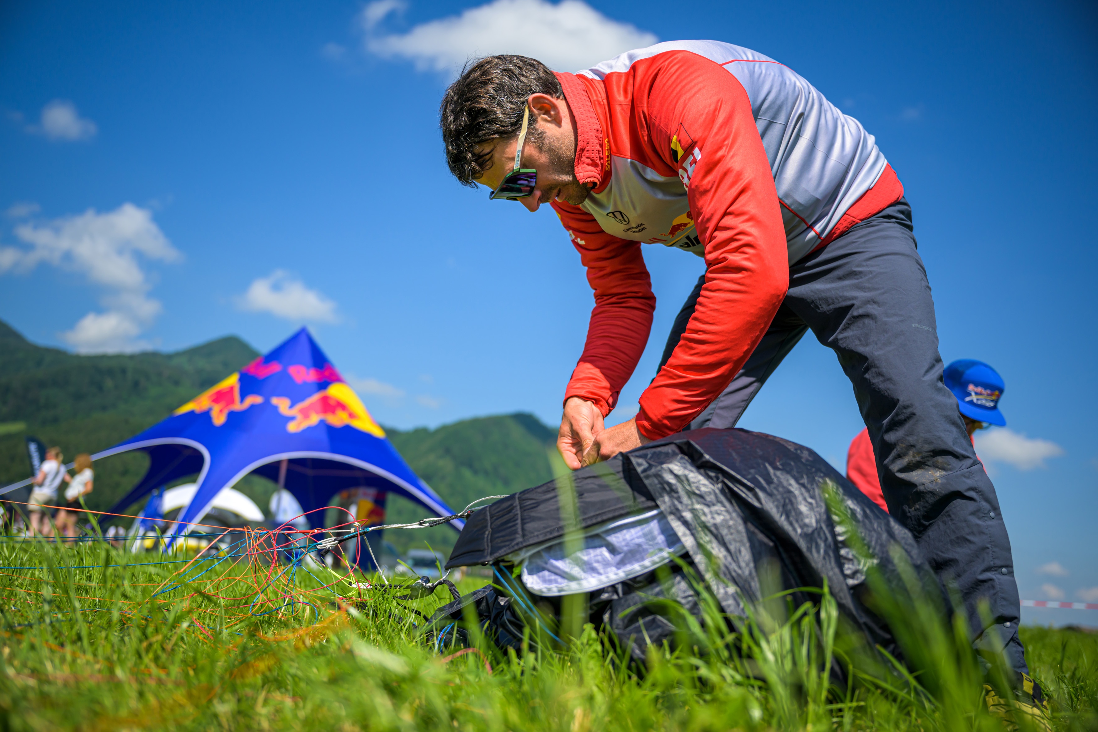 Thomas de Dordolot prepares during the Red Bull X-Alps in Chiemgau - Achental, Germany on June 12, 2023.