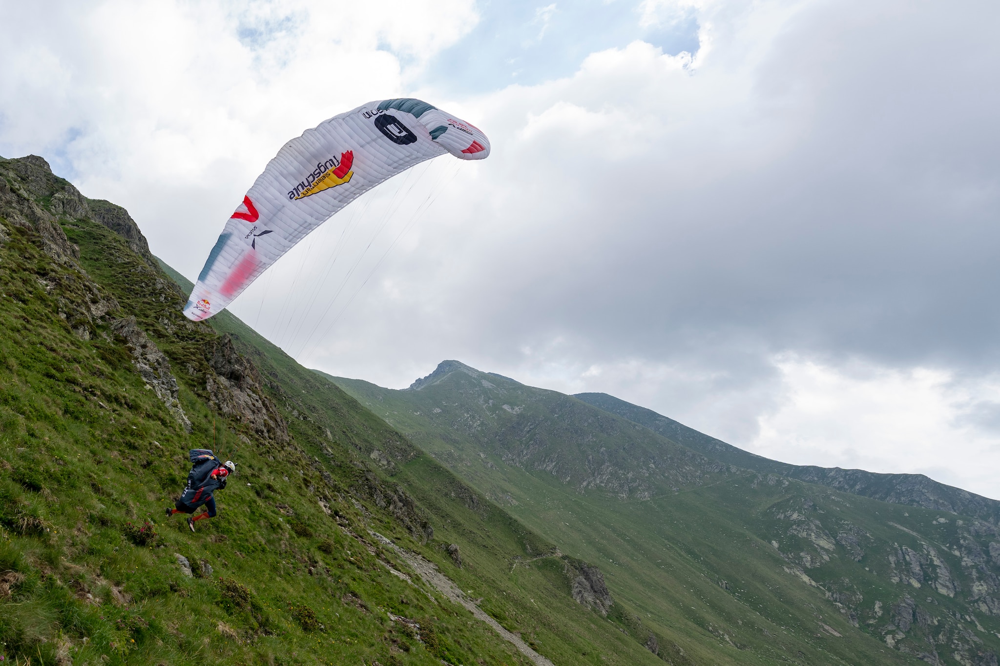 AUT2 performs during the Red Bull X-Alps in Carena, Switzerland on June 28, 2021.